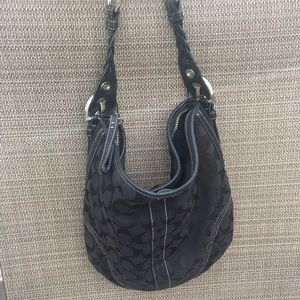 Coach monogram black canvas bag with leather trim and braided o-ring strap